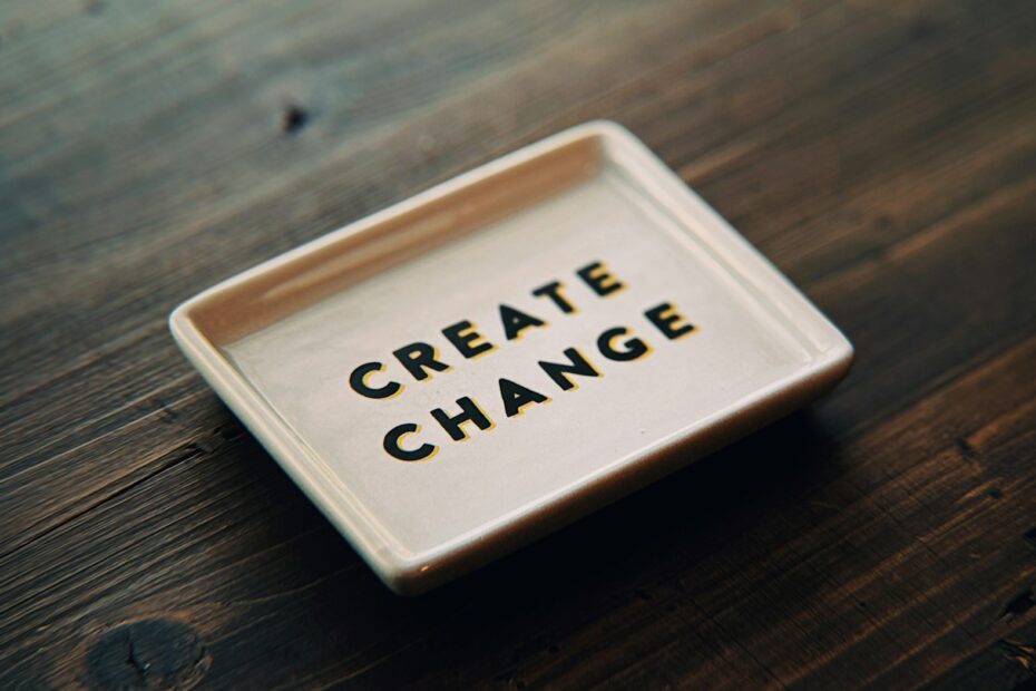 A white tray with the words create change written on it