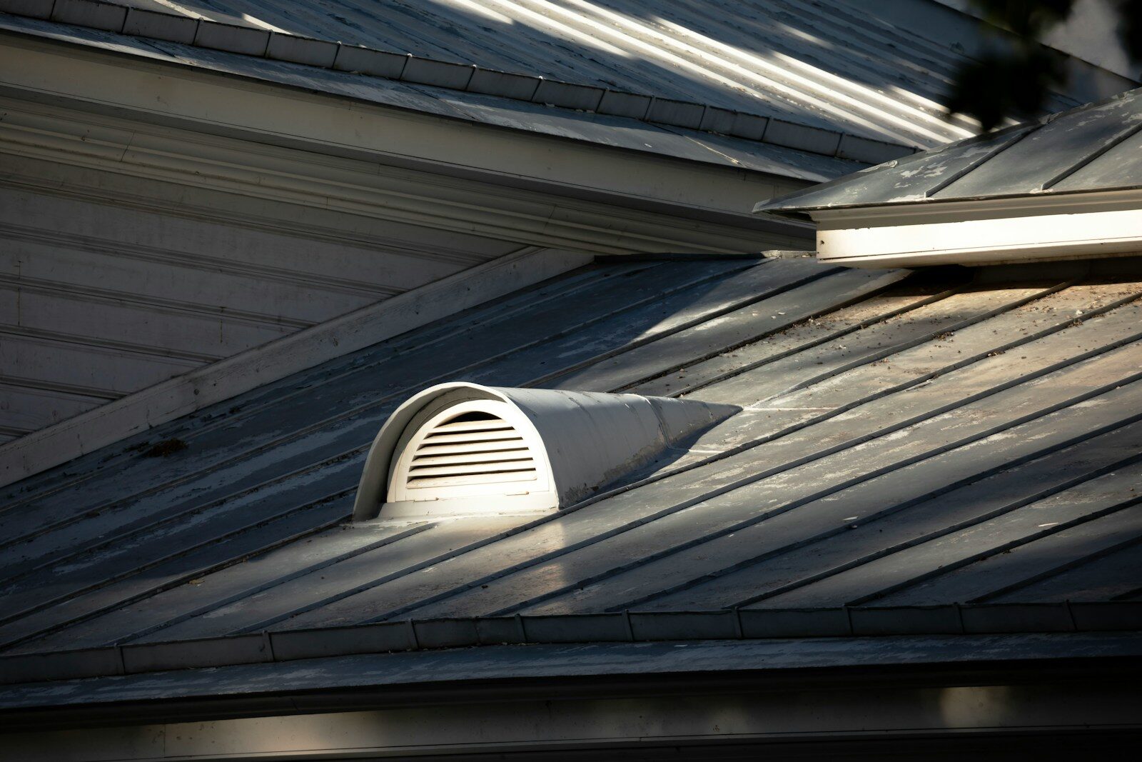 Metal roof with a ventilation vent